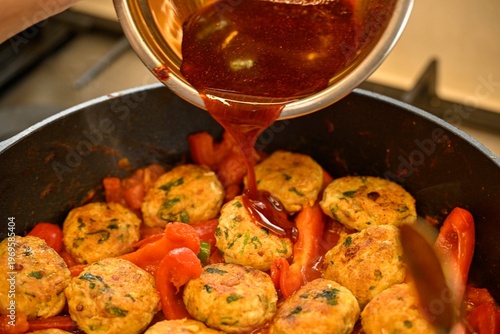Moroccan Fish Patties Frying in Pan During Passover Holiday Traditional Homemade Cooking Process Close Up of Fish Balls in Oil