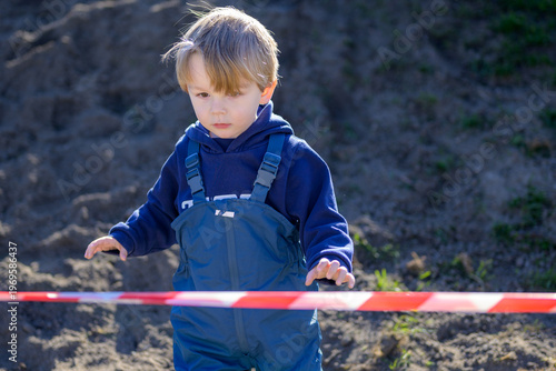 Toddler Exploring Outdoor Play Area