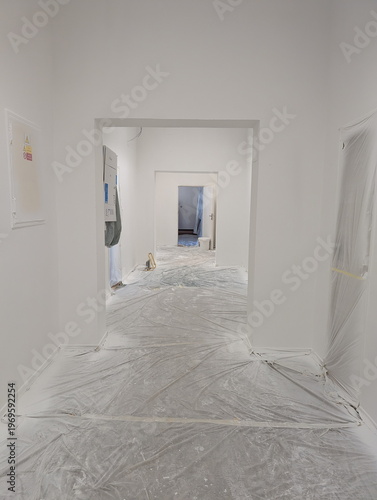 Freshly Painted White Hallway Renovation Progress