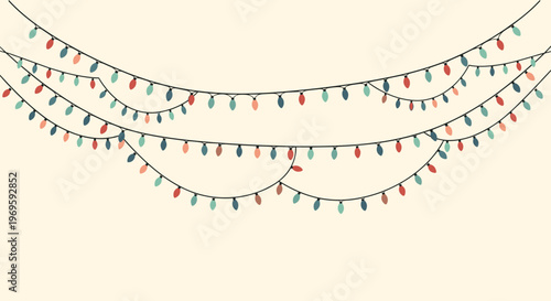 Decorative strings of colorful Christmas lights featuring small red green and blue bulbs hanging in festive swags for holiday decor.