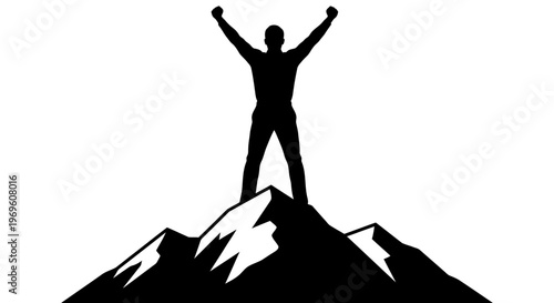 Man standing on mountain peak with arms raised in triumph
