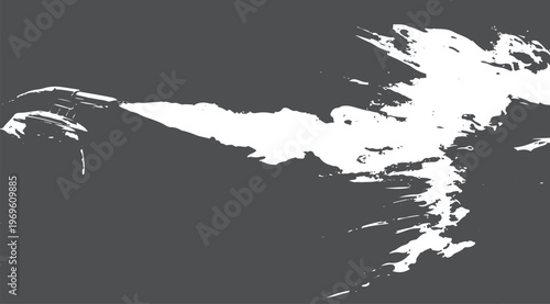 White paint spray streak on a dark grey background texture