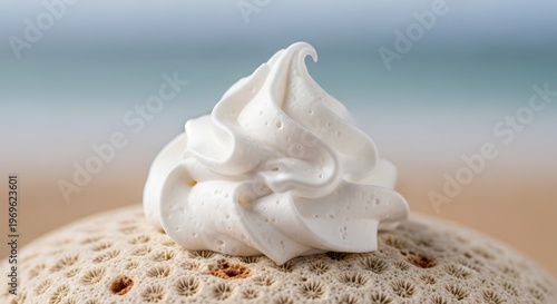 Whipped cream on sea urchin beach.