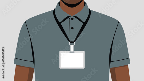 Person wearing a grey polo shirt with a black lanyard holding a blank ID card
