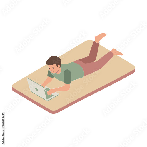 Man lying on a mat working on laptop indoors leisurely