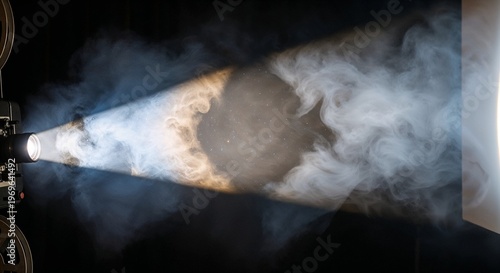 Projector casting beam of light through smoke in dark environment  