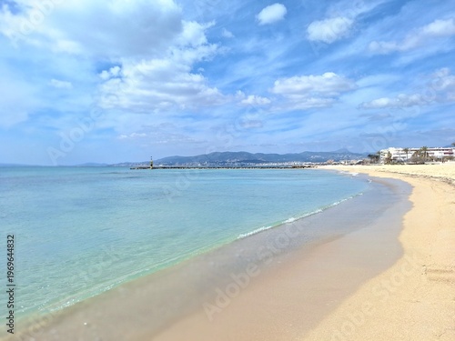 Mallorca beach view with astonish blue clear waters and a bright shying sky 