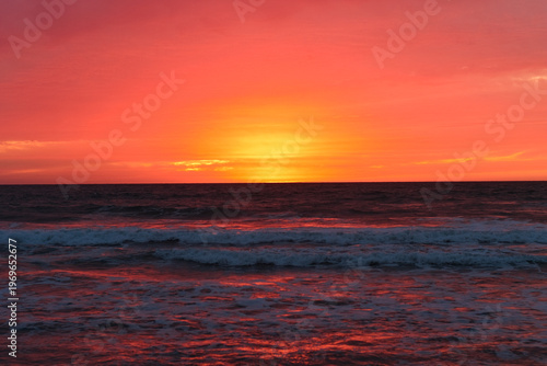 Pink Orange Sunset Over Pacific Ocean Waves California