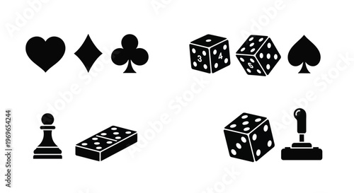 Black silhouettes of playing cards dice a pawn domino and joystick
