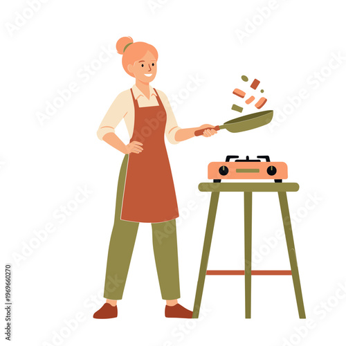 Woman cooking sausages on a portable grill outdoors with apron