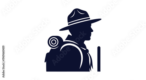 Ranger with backpack and walking stick a dramatic profile silhouette