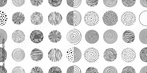 Abstract arrangement of various circular hand drawn patterns in grayscale