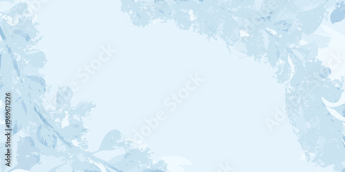 Delicate frost patterns cover a window creating a winter scene