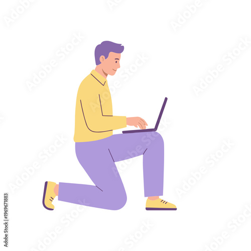 Man sitting on one knee working on laptop indoors digitally