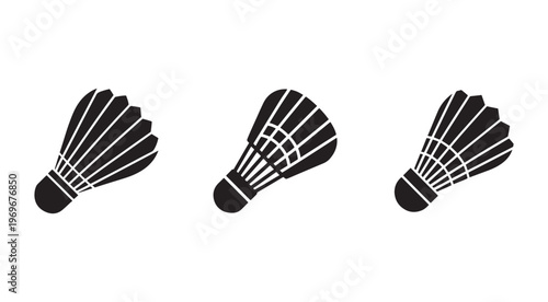 Three black badminton shuttlecocks icons in different positions on white background for sports and games design