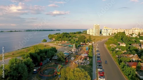 Aerial View of Amusement Park and Dnieper River Bank in Cherkasy City Ukraine at Golden Hour Sunset