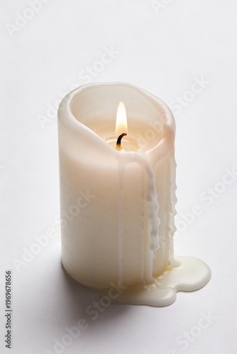 white candle on a dark background