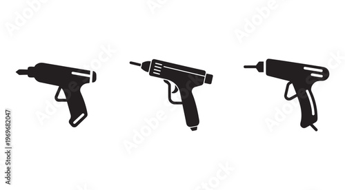 Three black drill gun silhouettes on white background for construction and DIY projects  power tools  drilling equipment