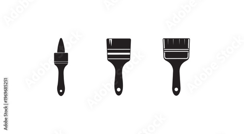 Three black paint brushes with different shaped heads for various painting tasks and techniques  art supplies
