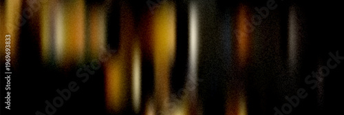 Abstract dark luxury background with golden bokeh light leaks, cinematic blurred warm glowing effect, elegant motion texture for premium design, banner, and creative backdrop.