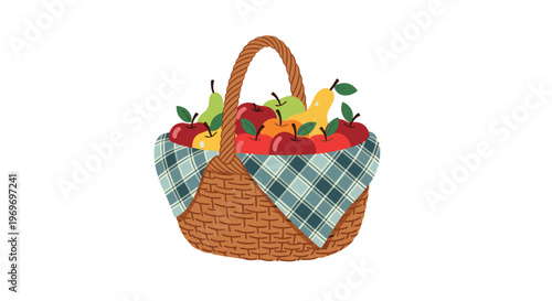 Traditional wicker basket filled with a bountiful harvest of fresh red apples and yellow pears on a checkered cloth.