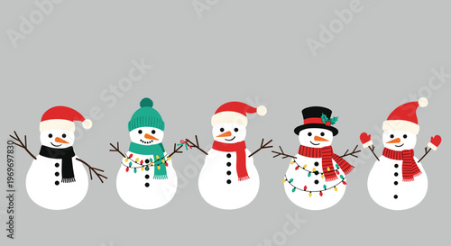 Five cute snowmen in a row wearing different colorful hats, scarves, and string lights against a neutral gray background for winter.