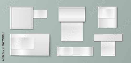 White fabric label mockup with realistic woven texture. Blank cotton tag sewn on cloth garment with detailed stitching, vector set isolated on background. Brand identity and apparel design product