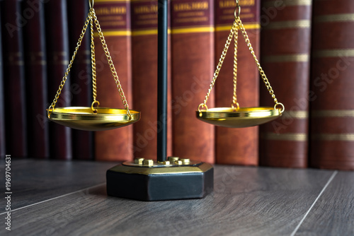 Scales of justice, symbolizing fairness, balance, and impartiality in legal decisions and the judicial system.