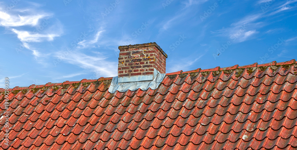 Naklejka premium Tiles, chimney or roof of house, building or outdoor with residential structure by sky. Architecture, home or ventilation for air pollution with brick on rooftop, weathered metal and moss with space