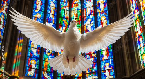 White dove with outstretched wings in front of stained glass window, peace and spirituality in cathedral interior