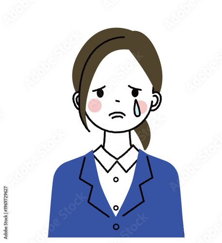紺色のスーツを着た若い女性　悲しそうな顔で涙を流している女性