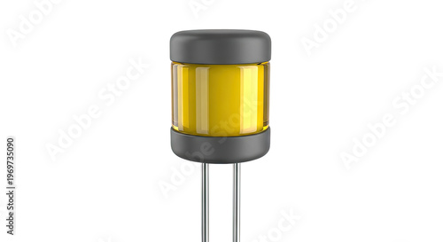Yellow glass cylindrical capacitor with metal leads