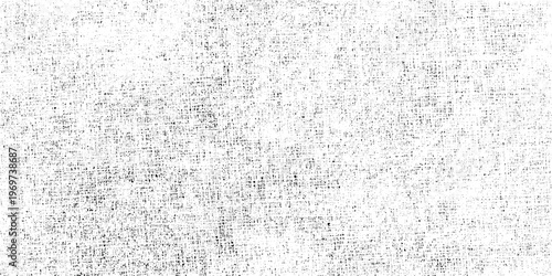 Grainy grunge textured background with noise effect in black and white for creative design and artistic projects