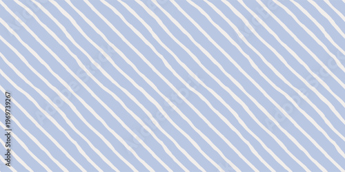 Seamless diagonal hand-drawn stripes pattern in periwinkle blue and white. Background with stripes. Banner