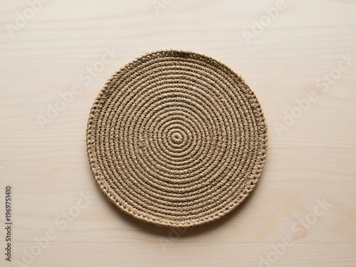 Rustic jute table mat with spiral pattern, perfect for table decoration