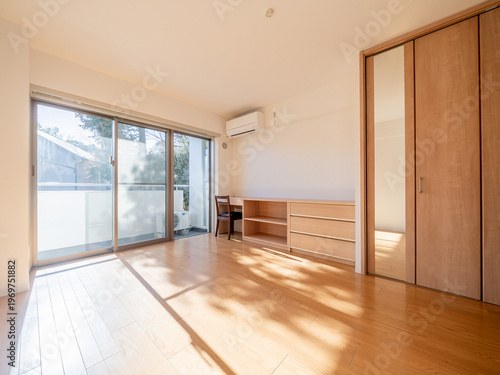Bright single living room with study desk and built-in storage