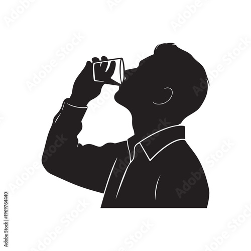 Silhouette of a Young Man Drinking Water From a Glass Cup. 
