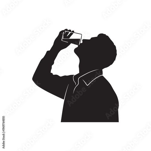 Silhouette of a Young Man Drinking Water From a Glass Cup. 