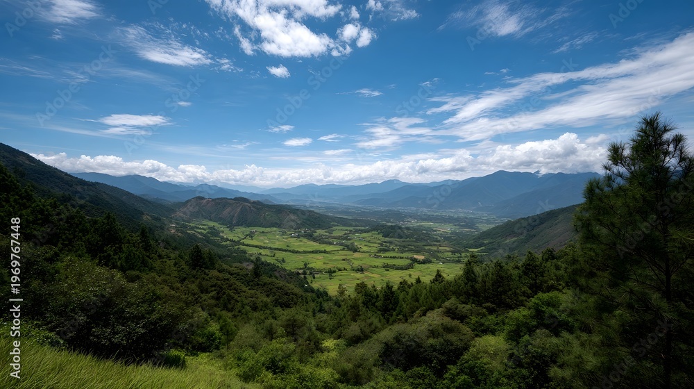 Fototapeta premium Breathtaking mountain vista with lush green valley below