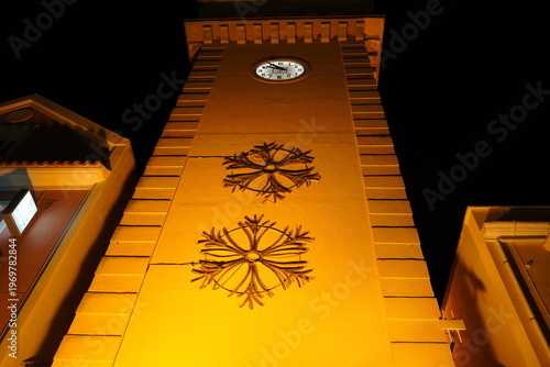 View of an iconic bell tower on the main street of the city at night, in Argostoli, Kefalonia, Greece
