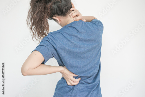 A woman experiencing body aches, including neck and back pain.