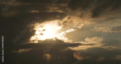 Time-lapse footage of clouds in a gloomy sky covered by rain and storm clouds.