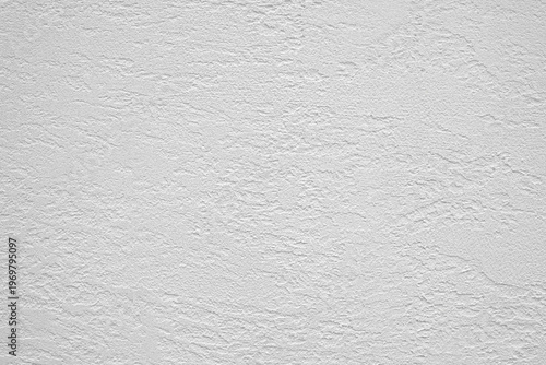 White gray wall with a rough texture. wall is covered in white paint. wall is not very smooth as white textured background web banner template page