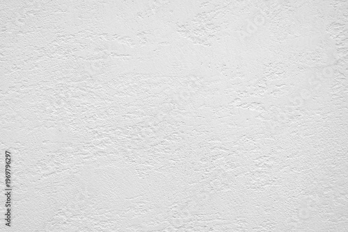 White gray wall with a rough texture. wall is covered in white paint. wall is not very smooth as white textured background web banner template page