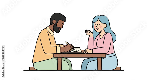 Couple working together on project while sitting at table  