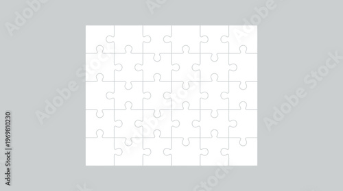 Blank white jigsaw puzzle grid on a solid grey background, showing individual interlocking pieces.