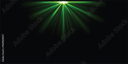 Intense green laser beam shining from darkness a dramatic light effect