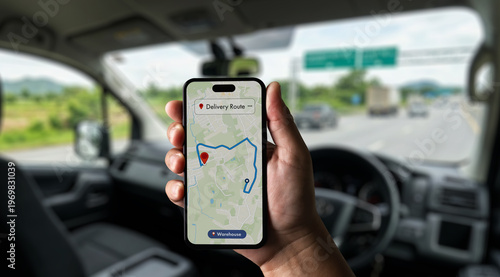 Fleet driver using smartphone navigation for delivery route tracking inside vehicle, supporting logistics monitoring, route optimization and operational planning for fleet management and business perf