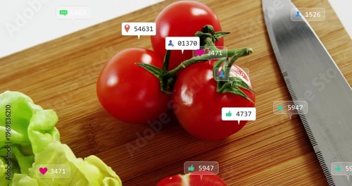 Tomato cluster resting on cutting board attracting animated engagement badges after recipe posting