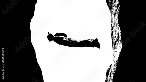 Skydiver Freefalling Through Cave Entrance, Extreme Sports Adventure